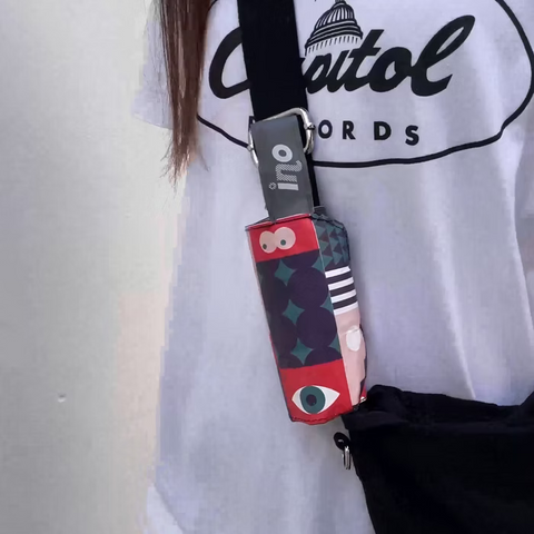 Get the Pong's "Look At Me" is a reusable face mask pouch. Its waterproof Tyvek shell and antimicrobial lining keep masks clean. Features a snap band, built-in sanitizer, and comes in 7 fun styles.