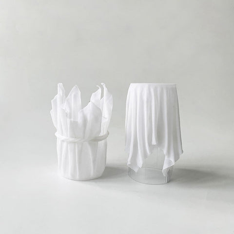 Get The Pong transforms old shirts into decorative resin vases or nutrient-rich planting soil through creative recycling.