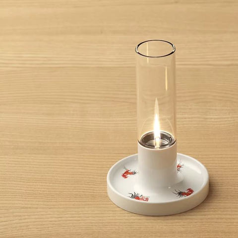 Close-up detail of the ceramic texture and wick mechanism on Get the Pong's TUNG HING x YUET TUNG OIL LAMP.