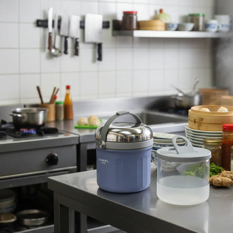 Get the Pong Tiffin 50 Light Purple Thermoses Food Flask, showing the stainless steel case, glass container, and push-to-release lid.