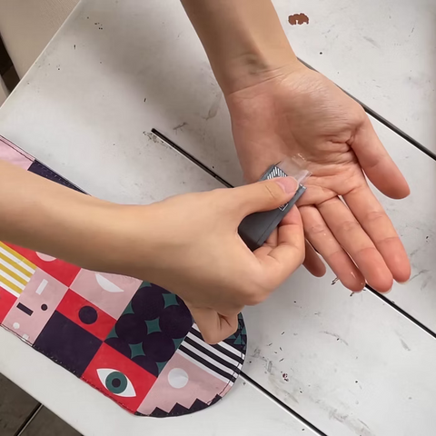 Get the Pong's "Look At Me" is a reusable face mask pouch. Its waterproof Tyvek shell and antimicrobial lining keep masks clean. Features a snap band, built-in sanitizer, and comes in 7 fun styles.