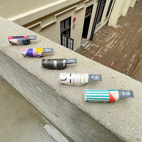 Get the Pong's "Let's Geo" pouch securely holds masks. Featuring a versatile snap band, waterproof Tyvek shell, antimicrobial lining, and integrated sanitizer dispenser.